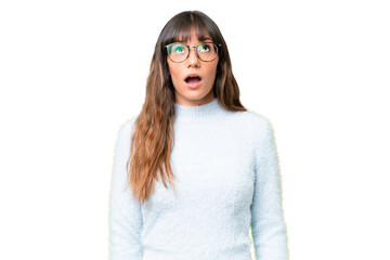 Young caucasian woman over isolated chroma key background looking up and with surprised expression