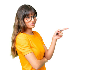 Young caucasian woman over isolated chroma key background pointing finger to the side