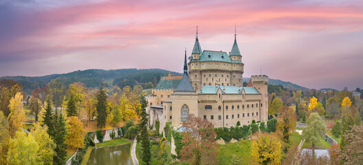 Bojnice Castle. Panoramic, Aerial view of neo-gothic romantic, fairytale castle in colorful autumn...