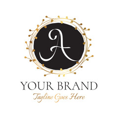 A Initial Letter Black and Gold Floral Hand Drawn Brand Logo