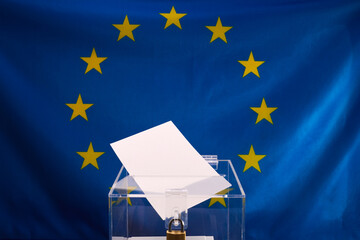European Union Voting Concept. A ballot being cast against an EU flag backdrop