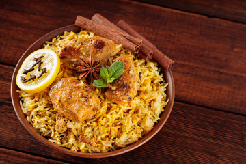 Authentic Chicken Biryani Close-up, Traditional Indian Dish of Rice and Chicken Marinated in Spices...
