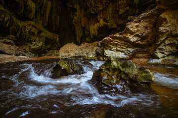 The beautiful views of the stalactite and stalagmite-filled cave in Lam Khlong Ngu National Park,...
