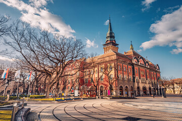 famous town hall as a symbol of the city history and architectural heritage, with its red facade...