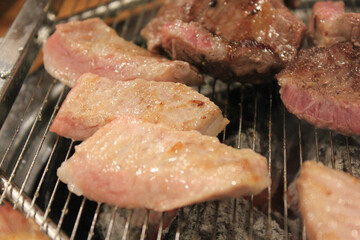 delicious grilled meat on barbecue