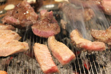 delicious grilled meat on barbecue