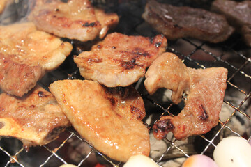 delicious grilled meat on barbecue