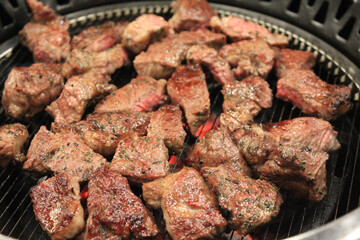 delicious grilled meat on barbecue