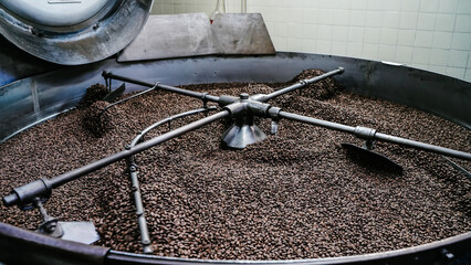 coffee beans background pattern of alot small brown coffee beans inside coffee beans big mixer at...