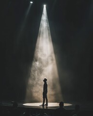 A solo performer stands on stage under a single spotlight, the audience holding their breath in anticipation