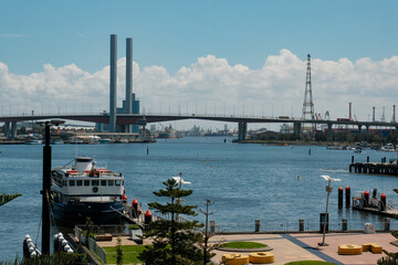 Sunny Harbor Vista: Melbourne Pier, Bridge, and Boats