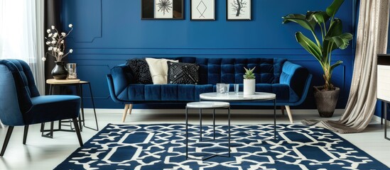 A black and white patterned carpet in a stylish blue living room.