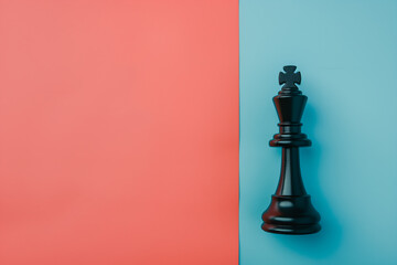 Chess king stands out on a vibrant colored background. Solo black king against a striking coral and...
