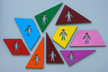 Diversity and inclusion abstract. Multi-colored figures with outlines of people.