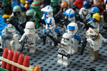 Fototapeta premium Prague, CZ -18.4.2024: Star Wars figures crafted from LEGO bricks are depicted in macro detail, offering a captivating play experience for kids that ignites their imagination and creativity. Editorial