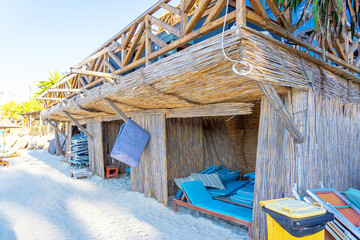 Beach gear put away at the end of the season, mattresses and beach chairs in a bathing area-Ksamil,...