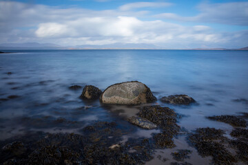 Seascape looking across Ganavan Bay with the Isle of Mull in the distance. Oban, Argyll and Bute, Scotland.