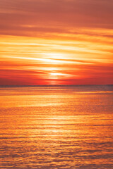 Beautiful red and orange sunrise over the sea.