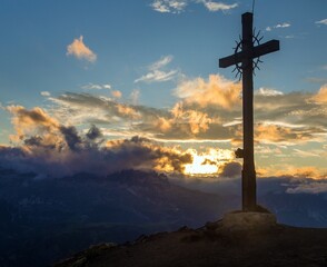 cross at the top of the hillsummit evening sunset view
