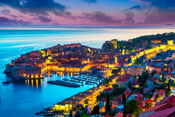 Dubrovnik, Croatia: Sunset view on the old town (medieval Ragusa) surrounded by fortified walls...