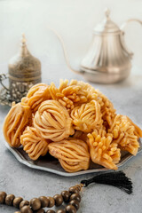 Muslim holiday sweets. Moroccan chebakia, chak-chak and handmade nath. Homemade Muslim sweet baked goods - 791132249