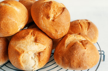 homemade buns. Homemade buns on wood board with wheat ears. Homemade Dinner Rolls, selective focus - 791133859
