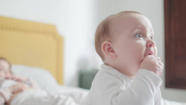 Family time at home with a curious baby