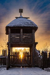Wooden gate and fort. Winter countryside