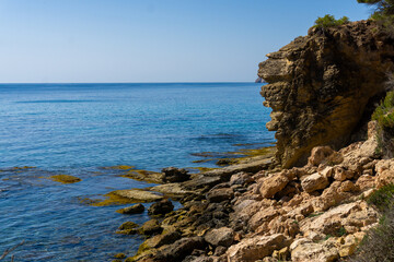 landscape of cliffs near Cala de Pinets Beach in Ecological walk Benissa Calp, province of...