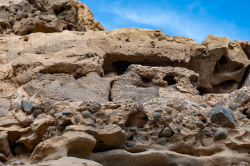 Oldest rocks of Canary Islands in cave network in town of Ajuy, north of Pajara, geological wonder consists of sedimentary substrates formed in deep ocean during Cretaceous period