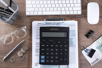 Tax accounting. Flat lay composition with calculator and document on wooden table