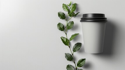 Gray paper cup with black lid The intricately placed branches of the coffee tree set the scene. Gives a subtle touch of natural elegance. There is space for text or advertisements. Suitable for promot