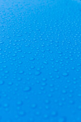 Water drops on blue background