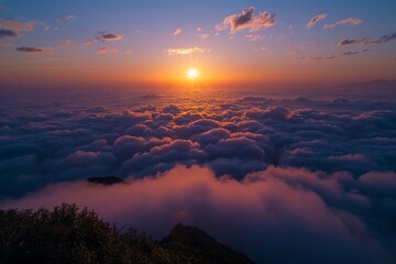 the sun is rising over clouds over the mountain - obrazy, fototapety, plakaty