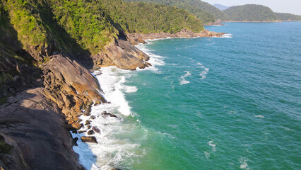Rocky coast in Trindade, Paraty, on the green coast of Rio de Janeiro. Tourist destination in...