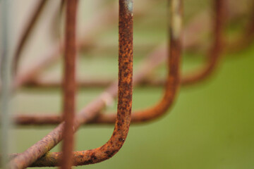 Close up of old and rusty iron fence	
