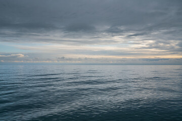 Fototapeta premium View of the Black Sea on the coast of Sochi against the sunset sky, Sochi, Krasnodar Krai, Russia