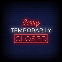 Sorry temporarily closed neon Sign on brick wall background 