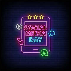 social media day neon Sign on brick wall background 