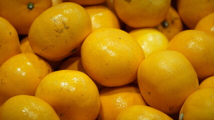 Korea Tangerines piled up in a fruit shop