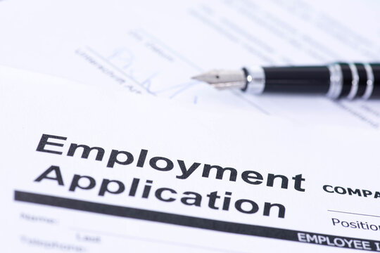 A pen and an employment contract