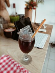 Glass of tea and ice cube