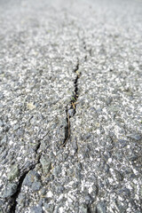 Cracked and damaged asphalt - 791256612