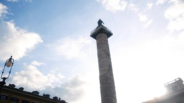 View of the Column of Marcus Aurelius (Italian: Colonna di Marco Aurelio) in the Center of Rome, Italy. 