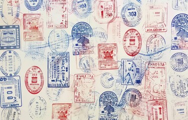 A white page features various passport stamps from different countries, creating an international vibe with colors including red and blue.