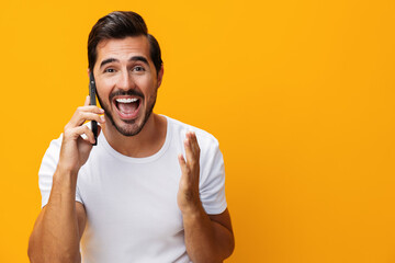 Man technology phone happy studio space communication cyberspace yellow mobile smiling smartphone...