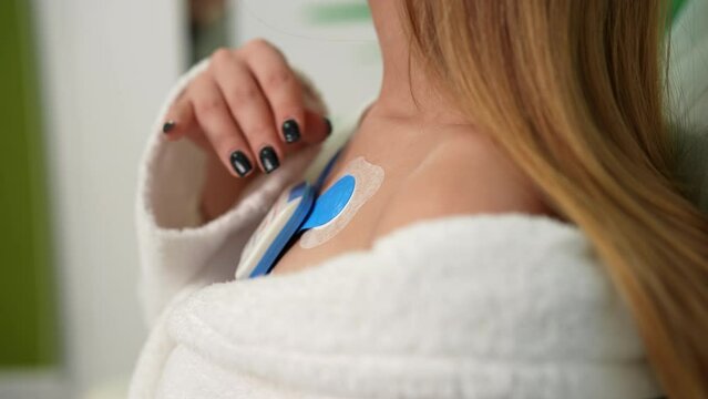TENS Electrode Therapy on Shoulder Close-Up