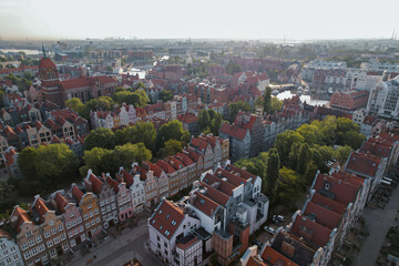 Beautiful panoramic architecture of old town in Gdansk, Poland at sunrise. Aerial view drone pov. Landscape cityscape City from Above. Small vintage historical buildings Europe Tourist Attractions 