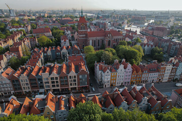Beautiful panoramic architecture of old town in Gdansk, Poland at sunrise. Aerial view drone pov. Landscape cityscape City from Above. Small vintage historical buildings Europe Tourist 