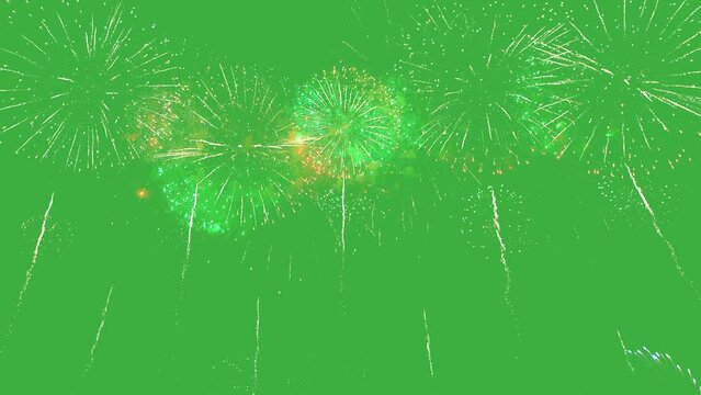 A lively green screen featuring an explosive fireworks display in various colors and patterns
